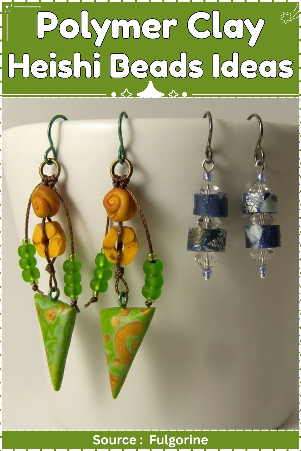 Two pairs of handmade polymer clay earrings displayed on a white cup, one with green triangle pendants and amber beads and one with stacked blue heishi and crystal beads.
