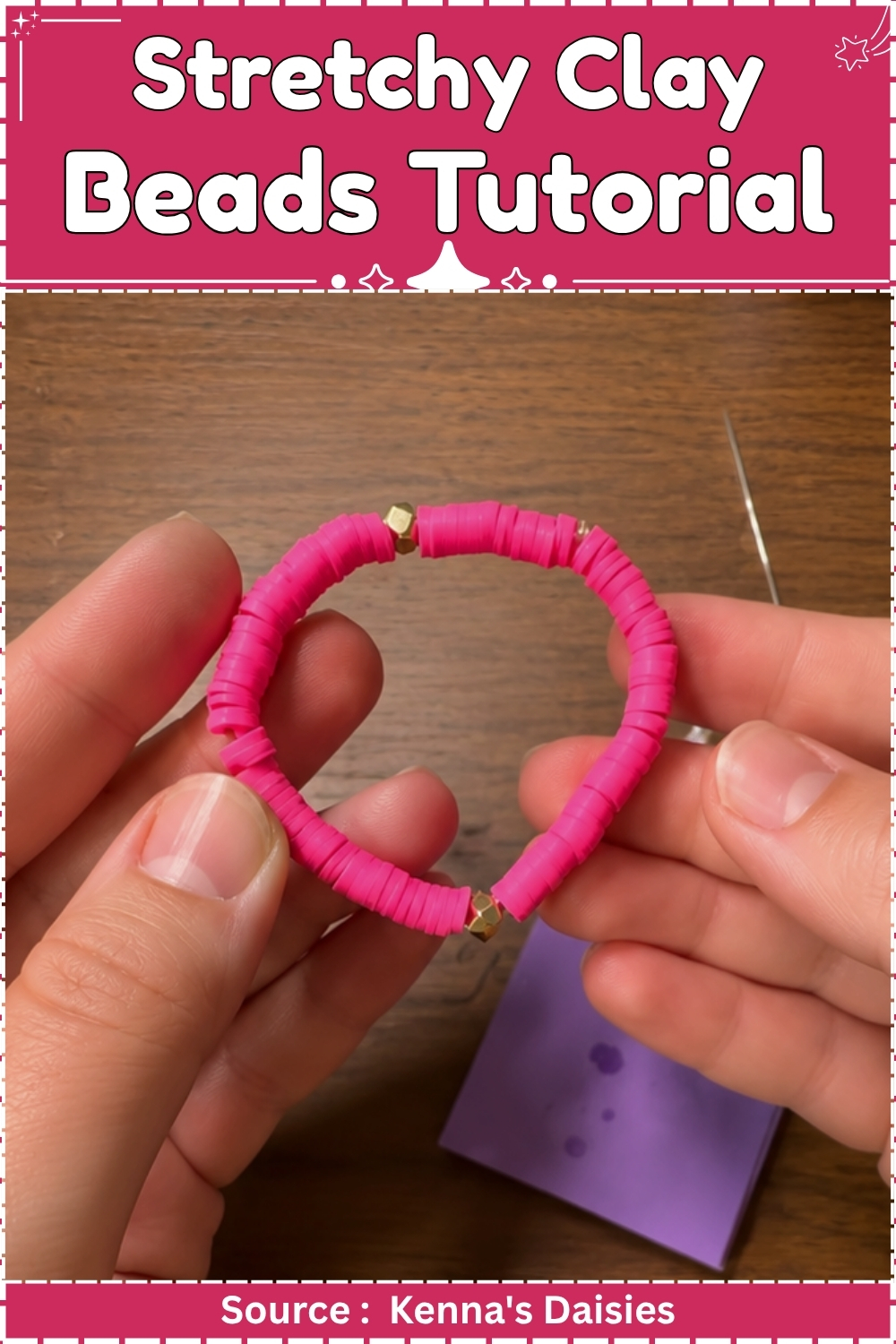 Hot pink clay bead bracelet with gold accent beads held between two hands over a wooden table