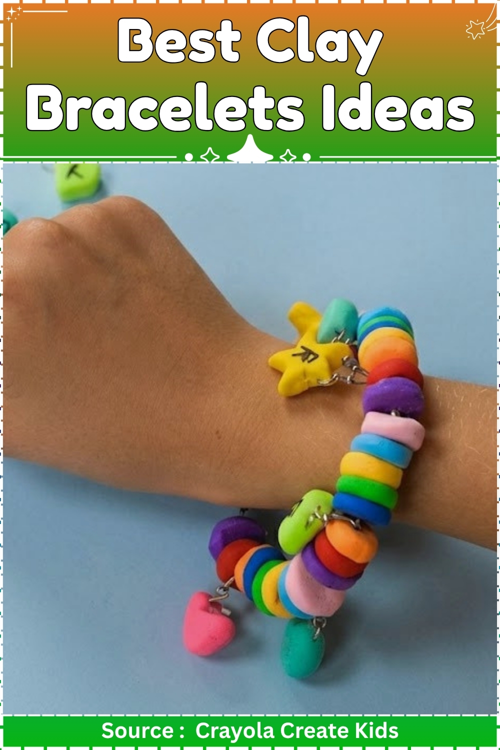 Child's wrist wearing a rainbow clay disc bracelet with handmade heart, star, and letter charm pendants dangling from jump rings on a blue background